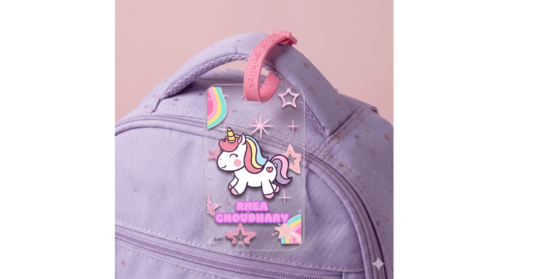 Personalized bag tag attached to a child’s school backpack for easy identification and safety.